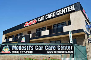Modesti's Car Care Center Logo Awning