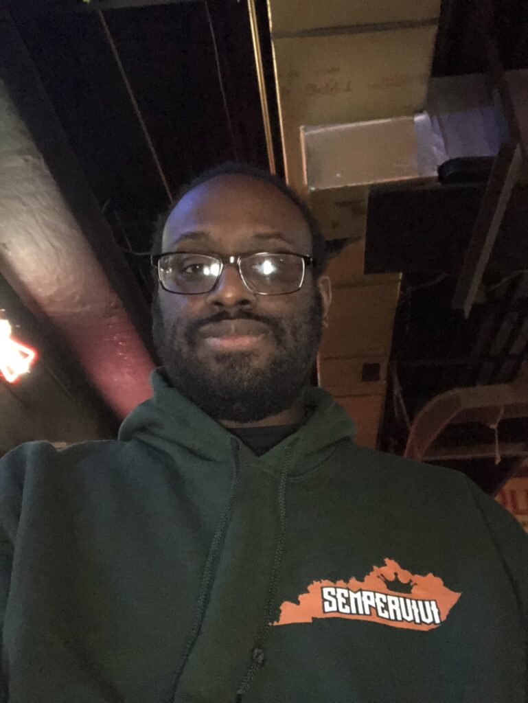 Award winning podcast host Kenny showing off his rad Sempervivi hoodie